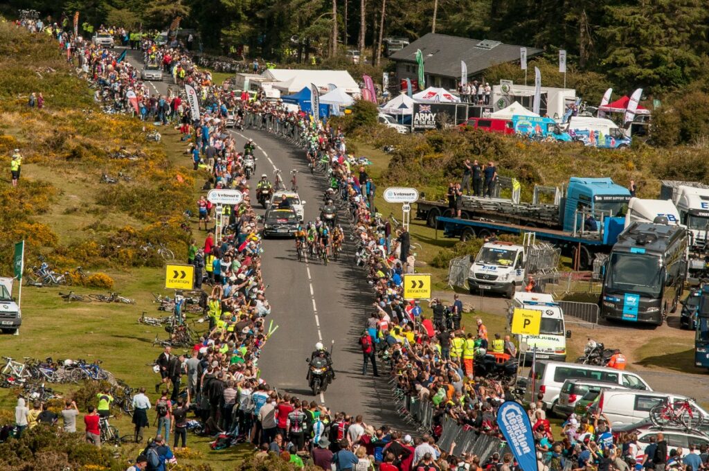 Crowds gathering at the bottom of Haytor ahead of cyclists crossing the finish line