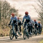 Photo of Freddie riding with his Ribble Weldtite teammates