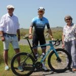 Photo of pro cyclist Freddie Scheske and councillors on Dartmoor