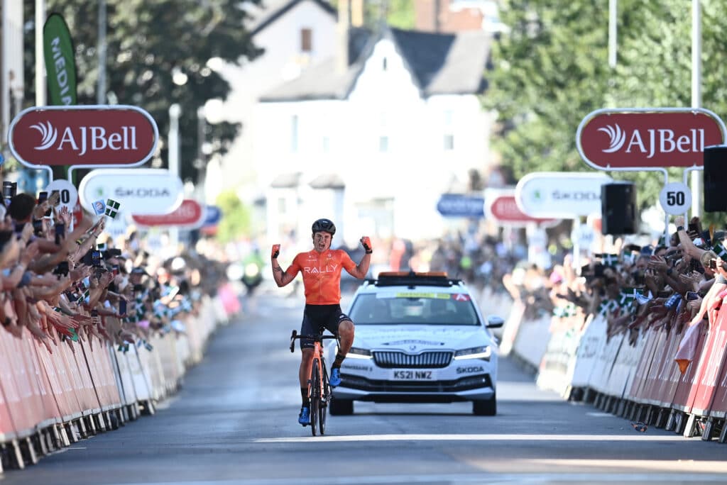 Photo of Robin Carpenter crossing the finish line in Exeter