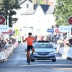 Photo of Robin Carpenter crossing the finish line in Exeter